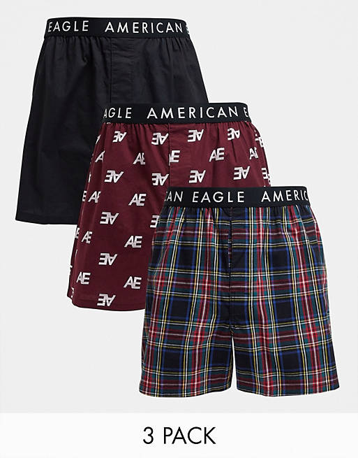 Pack de ropa interior de 3 shorts tipo bóxer diseño a cuadros/estampado integral del logo/negro liso de American Eagle | ASOS