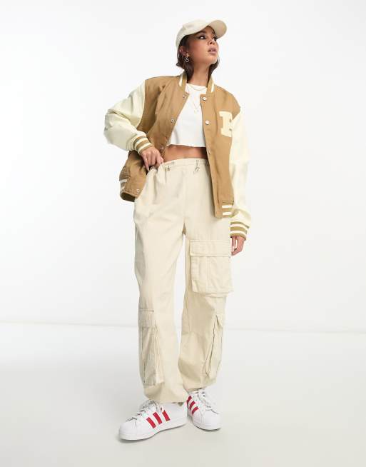 varsity jacket + cargos <3  Baseball jacket outfit, Jacket outfit women, Varsity  jacket outfit