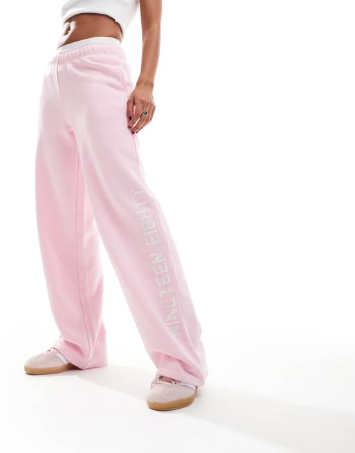 Pacsun sport slogan wide leg tracksuit trousers in pink