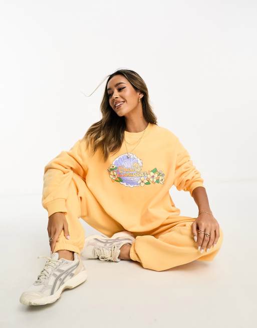 PacSun – Surf's Up – Pullover in Apricot-Creme mit Rundhalsausschnitt