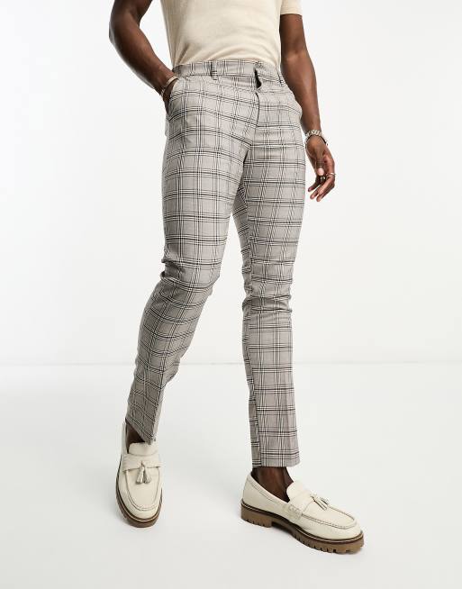 Pantalones a cuadros marrones de corte pitillo de New Look