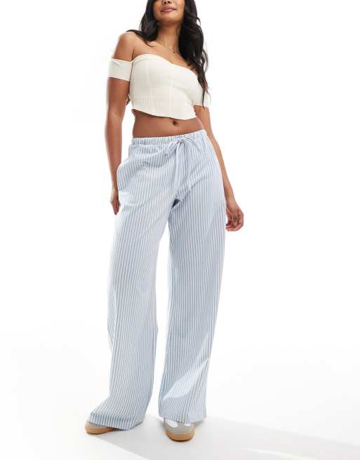Pantalones a rayas azules de pernera ancha con lazada en la cintura de ASOS DESIGN , 4 de 5