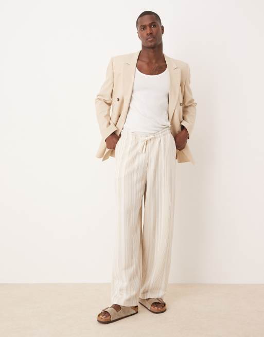 Pantalones a rayas beis muy holgados de ASOS DESIGN