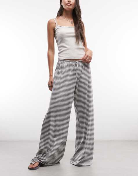 Pantalones a rayas gris melange de pernera ancha de tejido con caída de Weekday - view 1