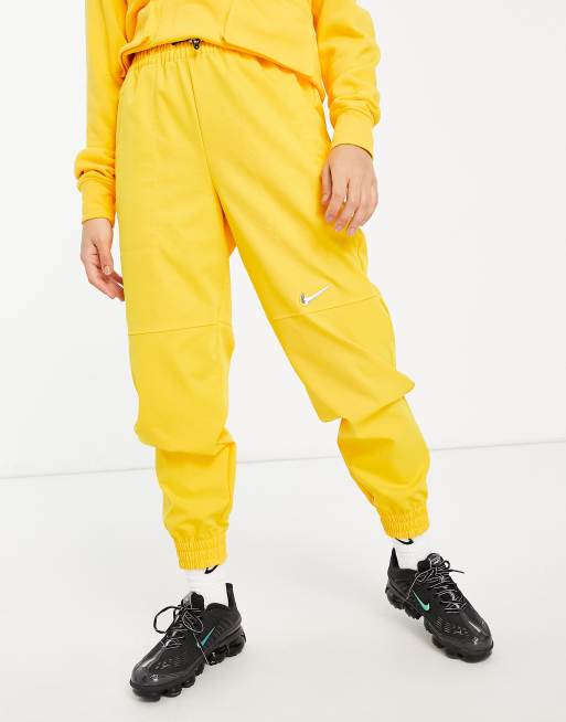 Pantalones nike cheap hombre amarillo