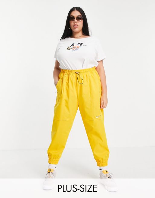 difícil Tantos este Pantalones amarillo dorado de punto con logo de Nike Plus | ASOS