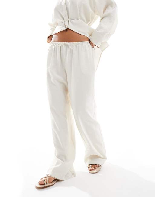 Pantalones amarillo pastel de pernera ancha con lazada en la cintura de modal de ASOS DESIGN (parte de un conjunto), 4 de 5