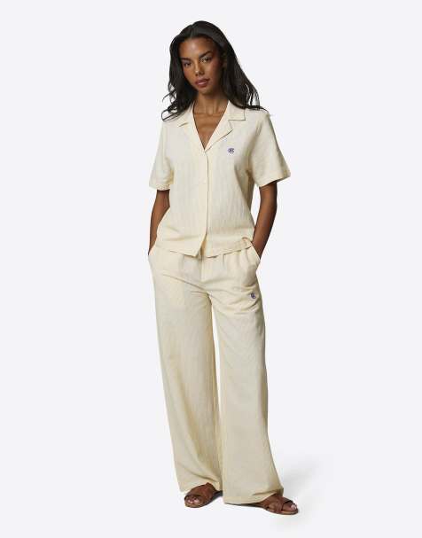 Pantalones amarillos holgados con raya diplomática y monograma de Good For Nothing - view 1
