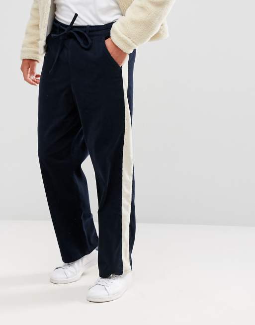 Pantalones anchos en pana azul marino con raya el lateral de ASOS | ASOS