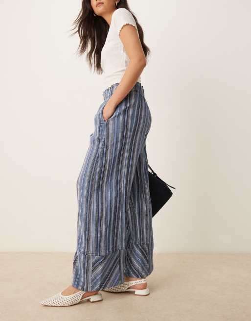 Pantalones azul añil a rayas de pernera ancha de Free People, 3 de 5