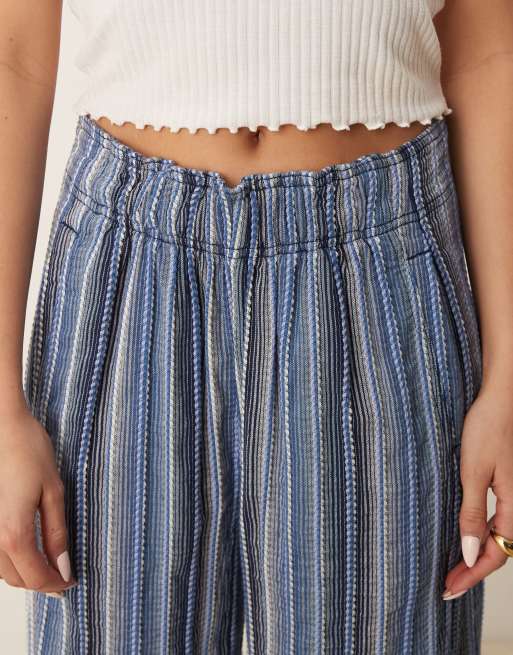 Pantalones azul añil a rayas de pernera ancha de Free People, 4 de 5
