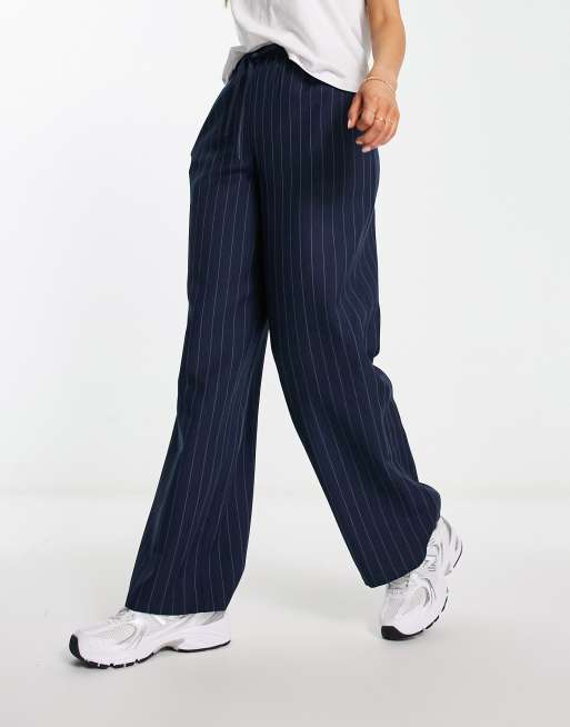 Pantalon azul marino online rayas blancas