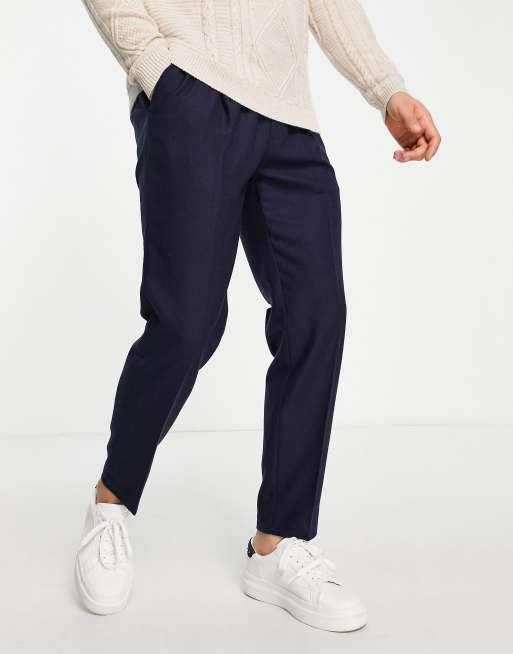 Pantalones azul marino con cintura elástica de corte tapered y tacto cálido de Topman
