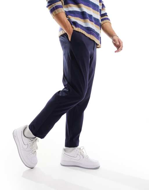 Pantalones azul marino de corte slim con cintura elástica de Harry