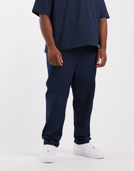 Pantalones azul marino de corte tapered de ASOS DESIGN (parte de un conjunto), 2 de 5