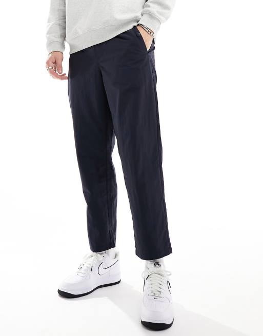 Pantalones azul marino técnicos de corte tapered holgado Hawtin de Farah, 5 de 5
