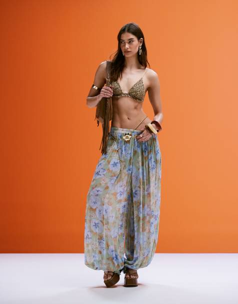 Pantalones azul pálido de corte voluminoso con estampado floral de Mango - view 1