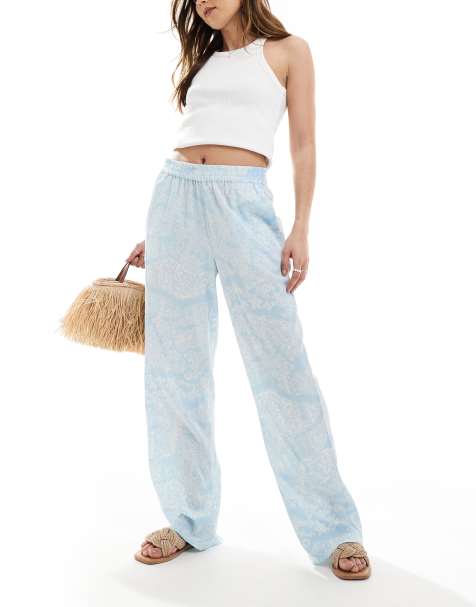 Pantalones azul pálido de pernera ancha sin cierres con estampado floral de Vero Moda - view 1