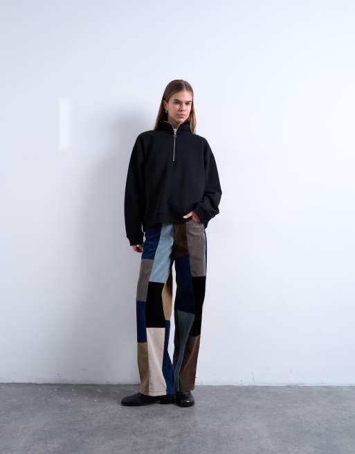 Pantalones azules con diseño tipo patchwork y trabilla ajustable de antelina de Topshop