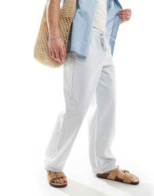Pantalones azules y blancos a rayas de corte ancho con cintura elástica de sirsaca de ASOS DESIGN, 2 de 5