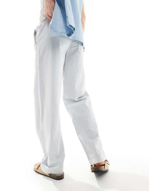 Pantalones azules y blancos a rayas de corte ancho con cintura elástica de sirsaca de ASOS DESIGN, 4 de 5
