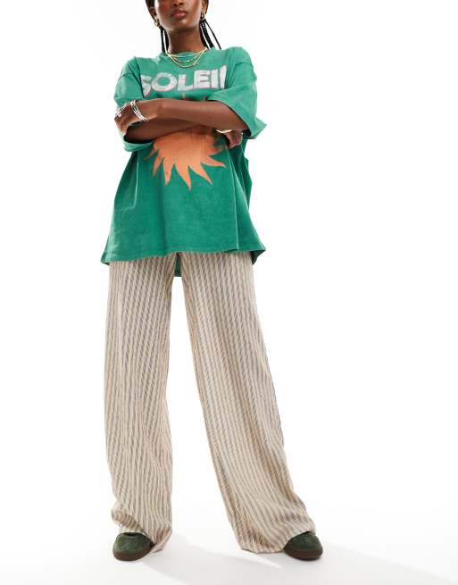 Pantalones beis a rayas de pernera ancha sin cierres de tejido texturizado de ASOS DESIGN