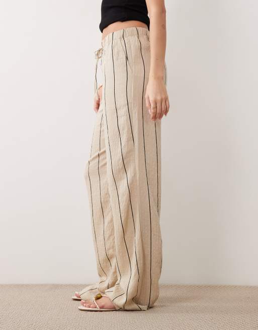 Pantalones beis a rayas negras de pernera ancha de JDY, 2 de 5