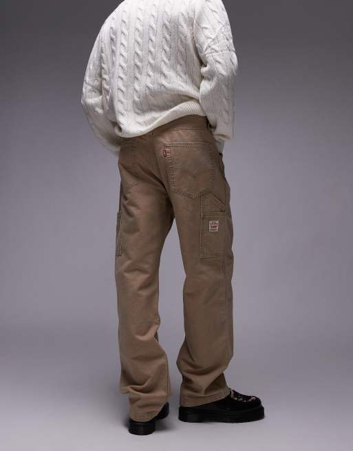 Pantalones beis de corte recto suelto de estilo carpintero de lona 568 de la colección cápsula Workwear de Levi's