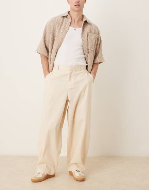 Pantalones beis de corte tapered extragrande de tejido efecto lino de ASOS DESIGN - view 1