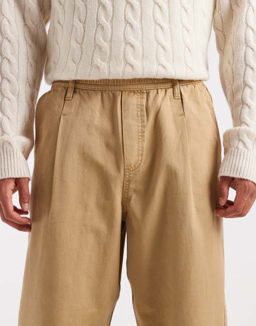 Pantalones beis de corte tapered holgado sin cierres de ASOS DESIGN, 4 de 5