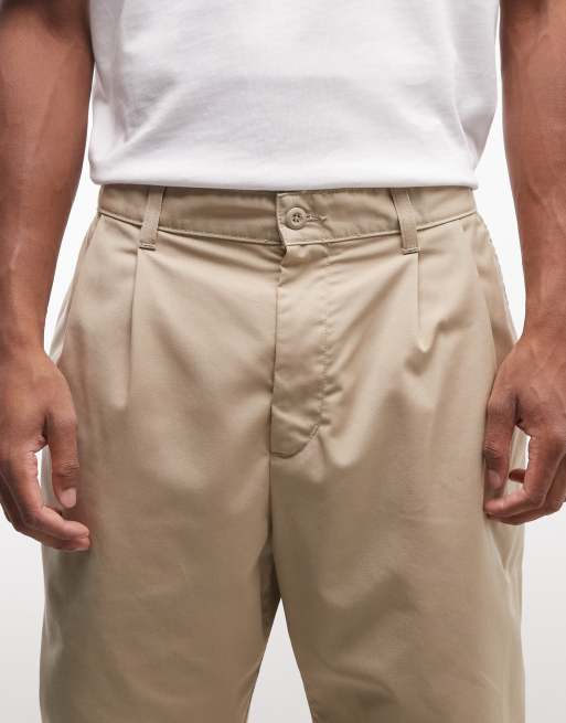 Pantalones beis de corte tapered suelto Evan de Carhartt WIP, 5 de 5