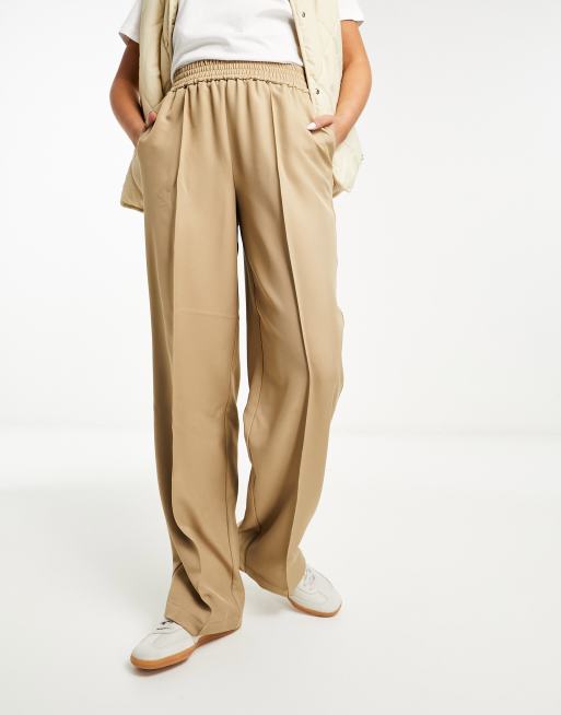 Pantalones beis de pernera ancha con cintura elástica y pinzas delanteras de Vila, 4 de 4