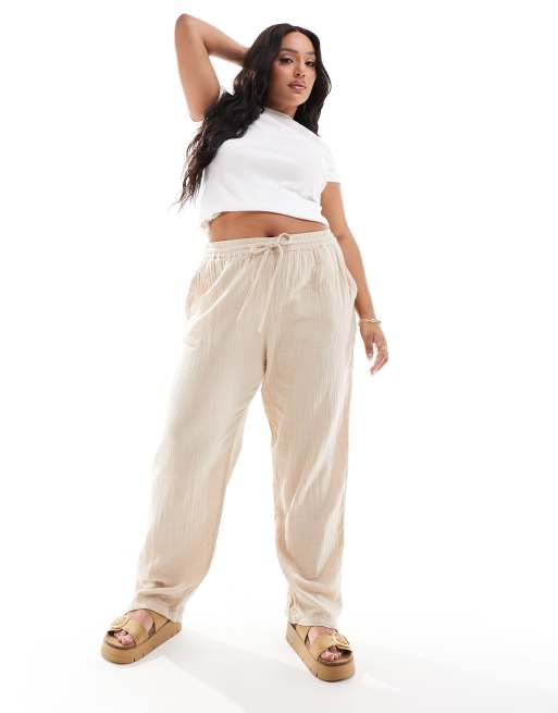 Pantalones beis de pernera ancha de bambula de ONLY Curve 