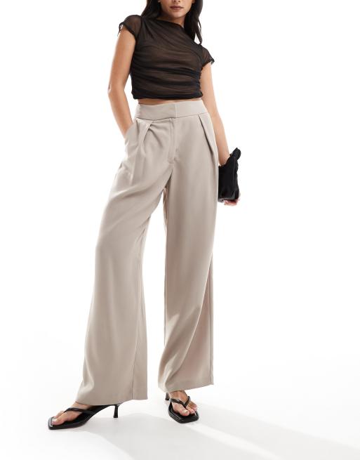 Pantalones beis de pernera ancha de River Island
