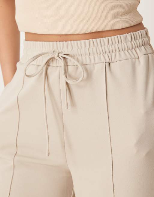 Pantalones beis de talle alto y pernera ancha con costura delantera de VILA, 3 de 5