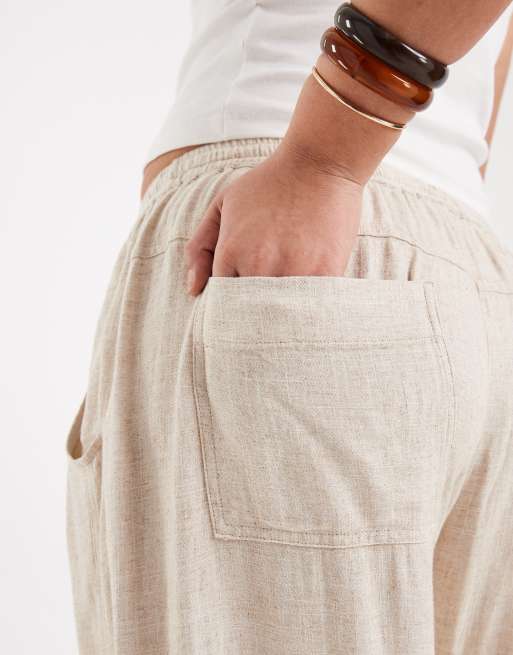 Pantalones beis utilitarios sin cierres de sarga de lino de ASOS DESIGN Curve, 5 de 5