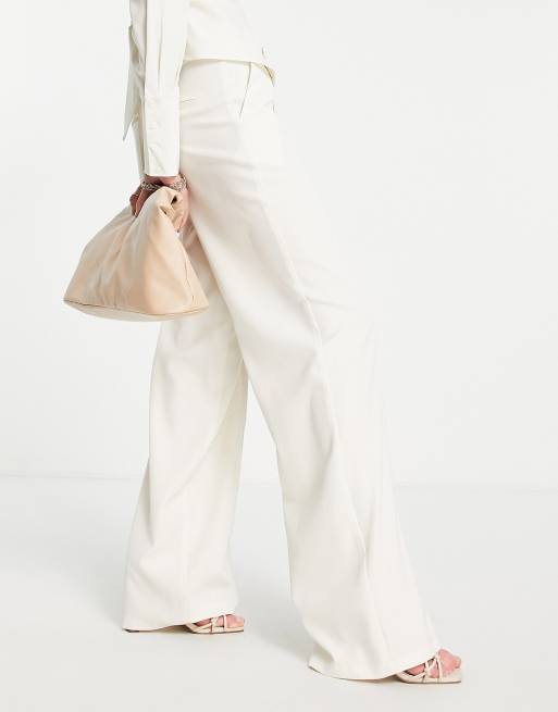 Pantalones blanco hueso de talle alto y pernera ancha de Extro & Vert