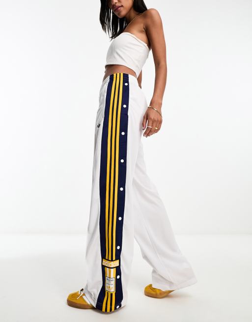 Pantalones blancos con diseño universitario adibreak de adidas Originals