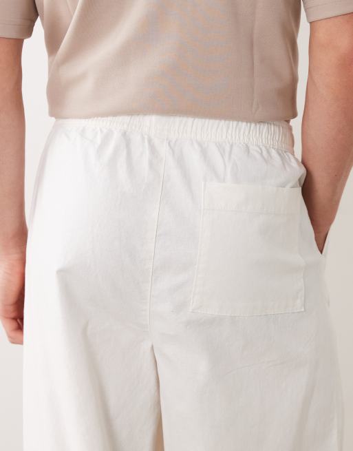 Pantalones blancos de corte suelto de mezcla de lino de ASOS DESIGN, 4 de 5