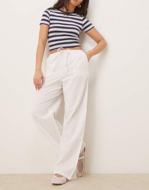 Pantalones blancos de pernera ancha con cordón ajustable en la cintura de mezcla de lino de Gina Tricot - view 1