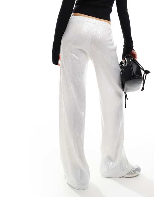 Pantalones blancos de pernera ancha de lentejuelas transparentes de ASOS DESIGN, 3 de 5