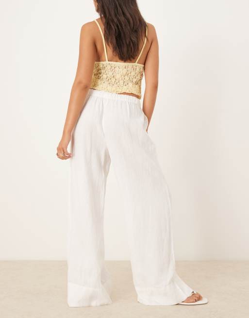 Pantalones blancos de pernera ancha de lino de Gina Tricot, 5 de 5