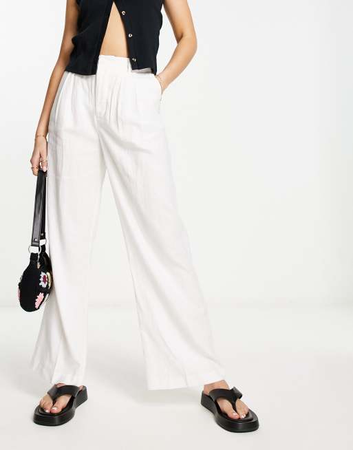 Pantalones blancos de pernera ancha de lino de New Look