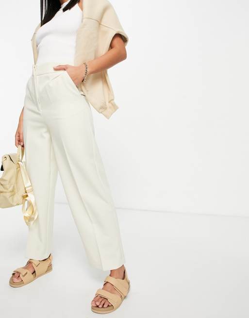 Pantalones capri color crema elásticos de Vero Moda