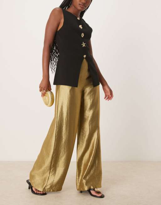Pantalones caqui claro con acabado metalizado dorado de Scalpers