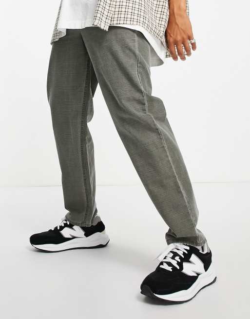 Pantalones caqui lavados de corte skater con bolsillos de estilo carpintero de ASOS DESIGN, 4 de 4
