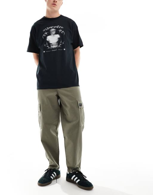 Pantalones caquis cargo extragrandes de corte tapered con bolsillos de parche de ASOS DESIGN