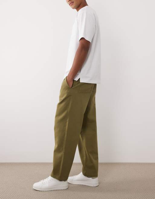 Pantalones caquis de corte tapered holgado con pinzas de ASOS DESIGN, 3 de 5