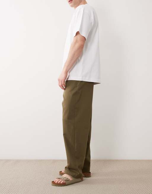 Pantalones caquis elásticos de corte tapered holgado de ASOS DESIGN, 4 de 6