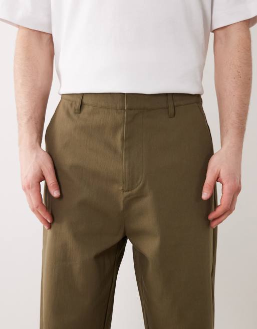 Pantalones caquis elásticos de corte tapered holgado de ASOS DESIGN, 5 de 6